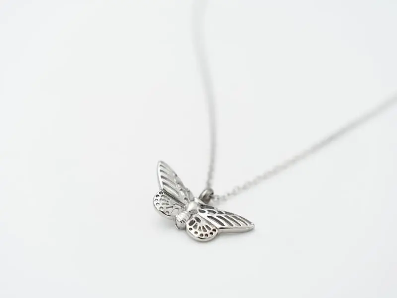 Colgante de acero para cenizas "Mariposa"