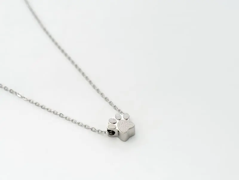 Colgante de acero para cenizas "Huella"